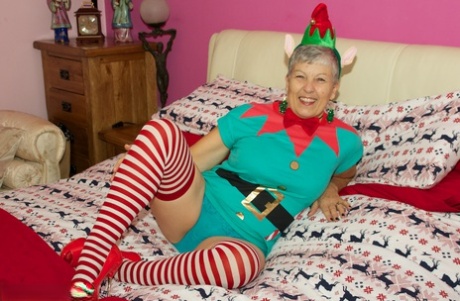 Old woman Savana sets her big natural tits free of cosplay outfit