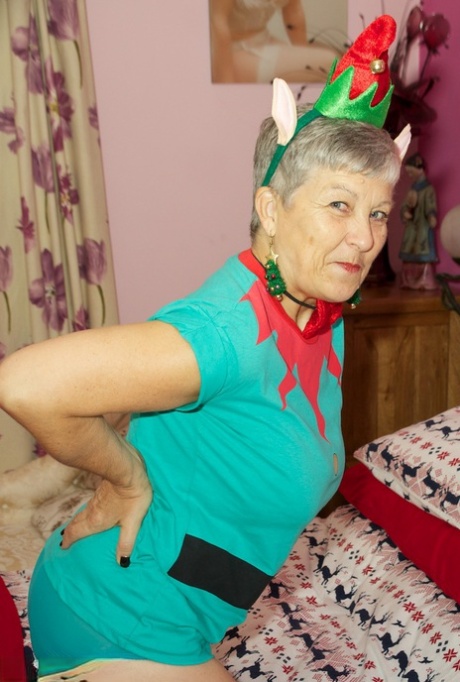 Old woman Savana sets her big natural tits free of cosplay outfit