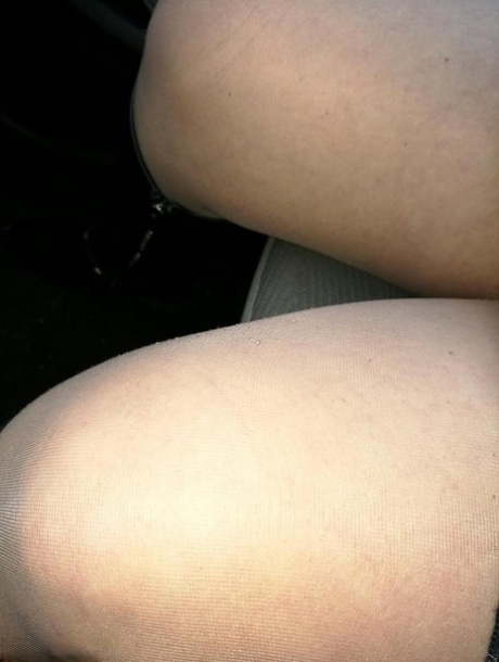 Hairy grandmother slides her upskirt panties aside to expose her vagina