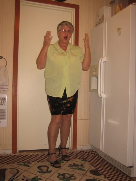 Old woman Girdle Goddess strips to pantyhose in her kitchen