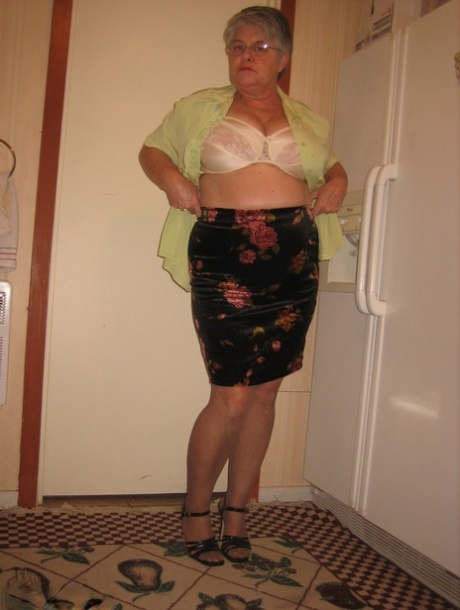 Old woman Girdle Goddess strips to pantyhose in her kitchen