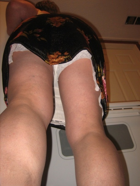 Old woman Girdle Goddess strips to pantyhose in her kitchen