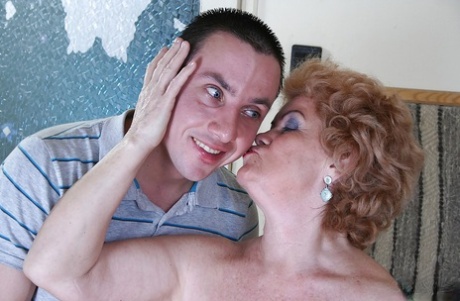 Curly-haired granny with hairy cunt has some rimming and twatting fun