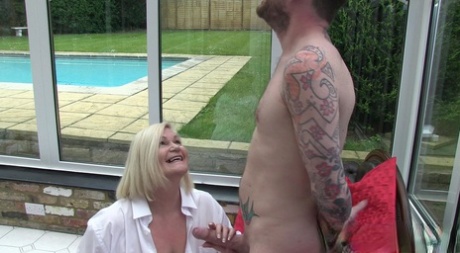 Chubby granny Lacey Starr enjoying hardcore sex with a young throbbing cock