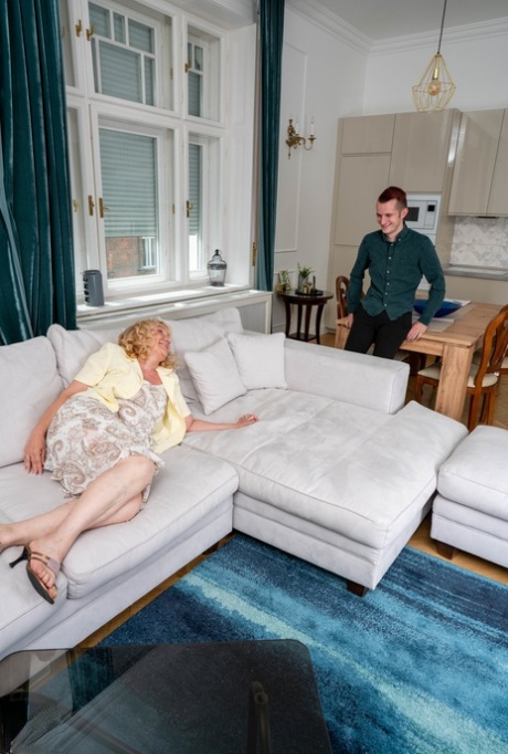 Horny wrinkled granny Maira B. strips naked to entice a new toy boy